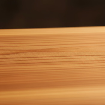 Close view of cedar bench slat showing finish